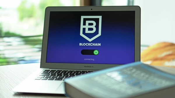 Laptop showing a blockchain app screen