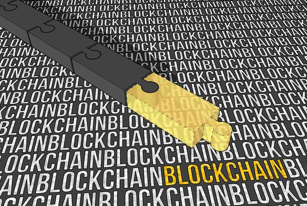 Key lying on a background of blockchain text